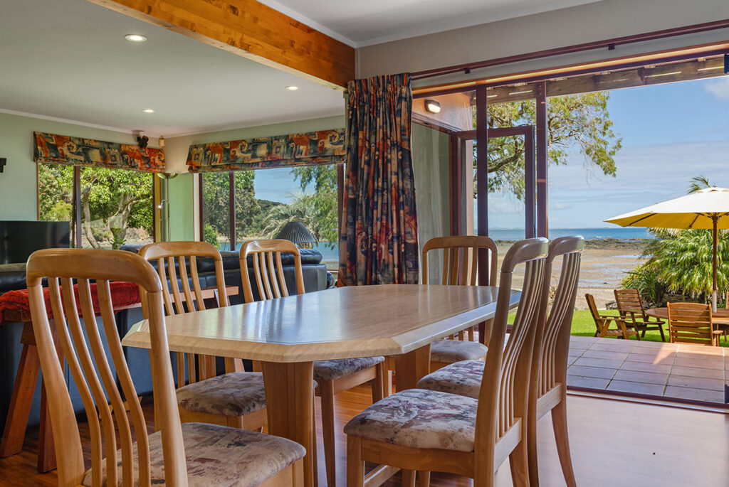 dining area with waterfront view sanctuary in the cove