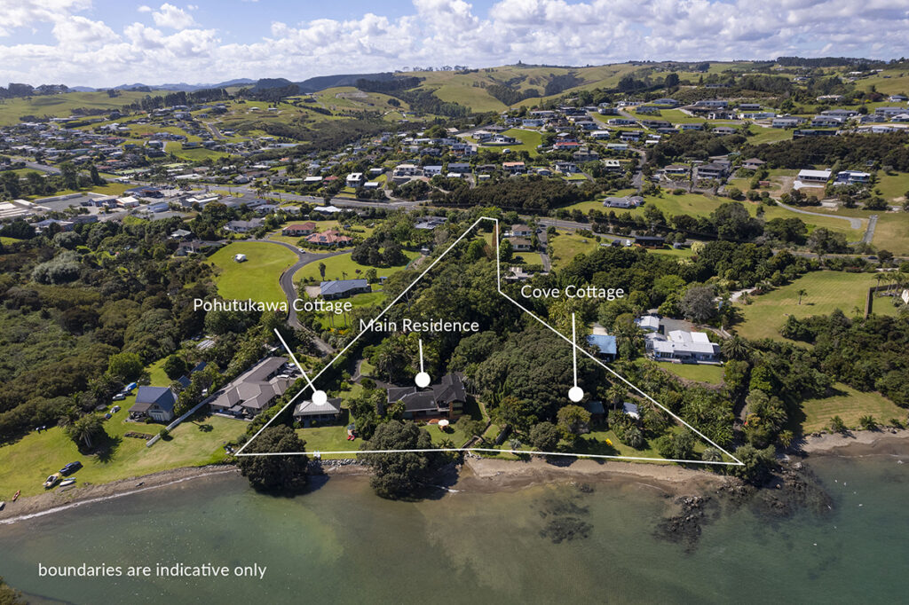 Aerial showing house and cottages for sale